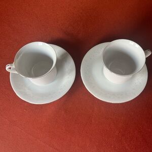 Elegant White Teacup and Saucer Set